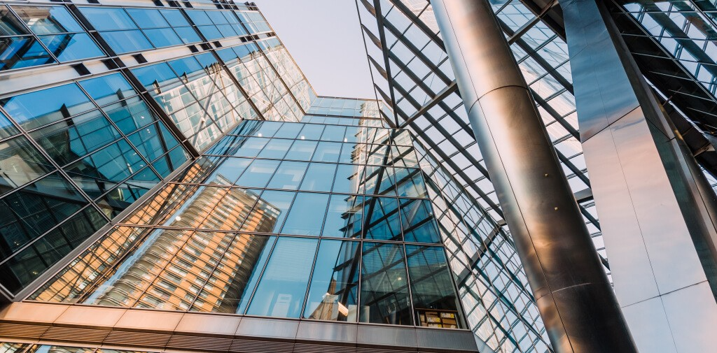 Upwards shot of reflections in the glass of a skyscraper