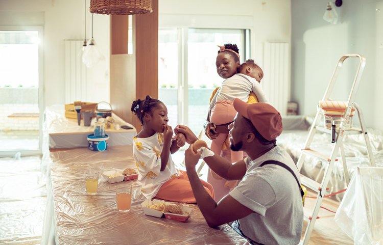 Family painting a room